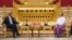 U.S. Secretary of State John Kerry (L) talks with Myanmar President Thein Sein during their meeting at the Presidential hall outside the venue of the 47th ASEAN Foreign Ministers' Meeting in Naypyidaw, Aug. 9, 2014.