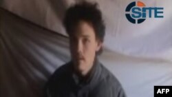 FILE - In this image released by the SITE Intelligence Group, Canadian hostage Colin Rutherford is shown in an Afghan Taliban video on its website on May 8, 2011. 