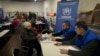 FILE - Employees of the U.N. Refugee Agency register refugees from the Donetsk region, the site of heavy battles with the Russian troops, in Pavlohrad, Dnipropetrovsk region, Ukraine, Dec. 12, 2024. 