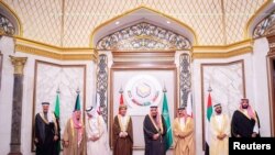 FILE - Saudi Arabia's King Salman bin Abdulaziz Al Saud with GCC leaders pose for a photo during the Gulf Cooperation Council's 40th Summit in Riyadh, Saudi Arabia, Dec. 10, 2019.