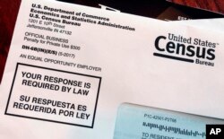 FILE - This March 23, 2018, photo shows an envelope containing a 2018 census letter mailed to a U.S. resident as part of the nation's only test run of the 2020 Census.