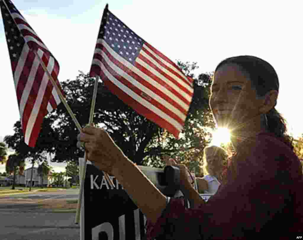 City Coucil candidate Kathleen Burson is seen outside a voting station in Titusville, Fla., as voters cast ballots in a midterm election that many predict will be transformational across the state and across the country, 02 Nov 2010