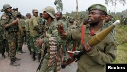 Basoda ba FARDC mampinga ma Ekolo Congo démocratique na bitumba na batomboki ba M23 na Kibati, pene na Goma , 30 aout 2013. 