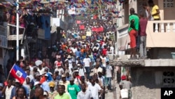 FILE - Protesters chant anti-government slogans during a protest against President Michele Martelly's government to demand the cancellation of the Jan. 24, elections, in Port-au-Prince, Haiti, Jan. 18, 2016.