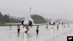 A team of Taiwan Air Force Mirage 2000 fighter jets participate in a military exercise in Hsinchu, northern of Taiwan, Jan. 16, 2019. Taiwan military started a two-day joint forces exercise to show its determination to defend itself from Chinese threats.