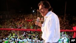 FILE - Presidential candidate Alejandro Toledo, of the political party Peru Possible, delivers a speech during a campaign rally in Lima, Peru, April 7, 2011.