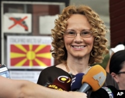 FILE - Radmila Sekerinska talks to the media in Macedonia's capital Skopje, June 5, 2011.