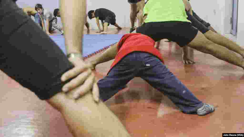 The karate and self-defense lessons at the Khora center are taken by both young and old, in the Exarchia district in Athens, Greece, Oct. 26, 2016.