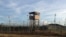This Dec. 11, 2016, photo shows an unused guard tower at Camp Delta, one of the parts of the detention center at the U.S. naval base at Guantanamo Bay, Cuba, that is now vacant as the detainee population reaches 59, the lowest it has been since early 2002.