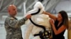 James Knight and Ondraya Frick from U.S. Army Medical Research Institute of Infectious Diseases train U.S. Army soldiers who are earmarked for the fight against Ebola, before their deployment to West Africa, Fort Campbell, Kentucky, Oct. 9, 2014.