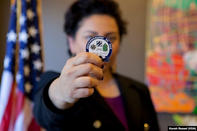 Assal Ravandi with one of the medals she received for her military service.