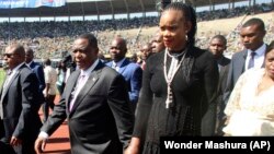 FILE: GOOD OLD DAYS ... imbabwean Deputy President Constantino Chiwenga is seen with his wife Marry, right, upon arrival for the inauguration ceremony of President Emmerson Mnangagwa, at the National Sports Stadium in Harare. 