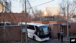 Buses believed to be carrying expelled diplomats leave the U.S. Embassy in Moscow, Russia, April 5, 2018. Russia last week ordered 60 American diplomats to leave the country by Thursday, in retaliation for the United States expelling the same number of Ru