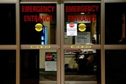 FILE - The entrance to the emergency room of Avera St. Luke's Hospital is pictured amid a COVID-19 outbreak in Aberdeen, S.D., Oct. 26, 2020.