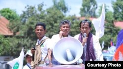 Grassroots Democracy Party’s co-founders Yeng Virak and Yang Saing Koma in action during a campaign ahead of June 4, 2017 Commune Elections. (Photo: Grassroots Democracy Party)