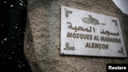 FILE - The plaque of the Al-Mahabba mosque is seen in Alencon, France, November 25, 2015. The voice claiming Islamic State's responsibility for the deadly Paris attacks is known to many in the small French provincial town of Alencon. 