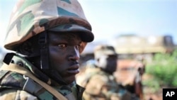 Member of Ugandan contingent of AMISOM forces during advance with Somali National Army to Baidoa from Ballidoogole airbase, Somalia, Oct. 18, 2012.