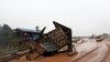 A military helicopter flies during the flood after the Xe Pian-Xe Namnoy hydropower dam collapsed in Attapeu province, Laos, July 26, 2018.