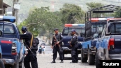 Members of Nicaragua's Special Forces patrol the streets after clashes with anti-government protesters in the Sandino neighborhood in Jinotepe, Nicaragua, July 24, 2018.