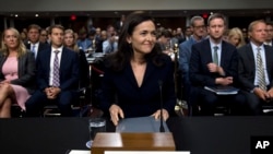 FILE - In this Sept. 5, 2018, file photo Facebook COO Sheryl Sandberg testifies before the Senate Intelligence Committee hearing on 'Foreign Influence Operations and Their Use of Social Media Platforms' on Capitol Hill in Washington. 