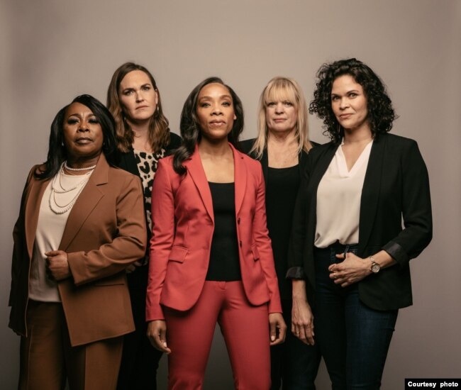 Fawn Weaver (center in red) with her leadership team at Uncle Nearest Premium Whiskey, including master distiller Victoria Eady Butler (far left), the great‐great‐granddaughter of Nearest Green. (Photo courtesy Uncle Nearest Premium Whiskey)