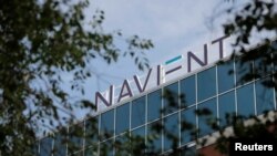 FILE - Signage is seen on the offices of Navient in Wilmington, Delaware, June 9, 2021.