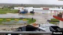 A view shows damages caused by Super Typhoon Yutu in Tinian, Northern Mariana Islands, Oct. 25, 2018, in this still image taken from a video obtained from social media.