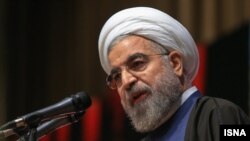FILE - With the sudden death of Iranian President Hassan Rouhani's mother, the country's negotiators on an international nuclear arms deal left Switzerland Friday. Talks are set to resume next week.