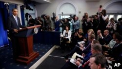 President Barack Obama speaks during his end-of-the-year news conference in the Brady Press Room at the White House in Washington, Dec. 20, 2013.