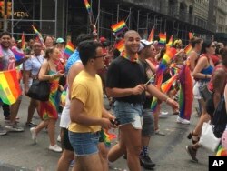 Participants march in the 2018 Gay Pride Parade in New York City, June 24, 2018.