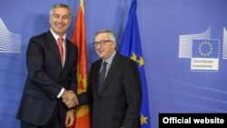 Crnogorski premijer Milo Đukanović i predsednik Evropske komisije Žan Klod Junker tokom susreta u Briselu