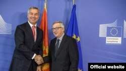 Crnogorski premijer Milo Đukanović i predsednik Evropske komisije Žan Klod Junker tokom susreta u Briselu