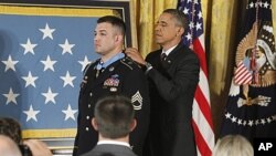 President Barack Obama awards US Army Sergeant First Class Leroy Arthur Petry of Santa Fe, New Mexico the Medal of Honor for his valor in Afghanistan, July 12, 2011