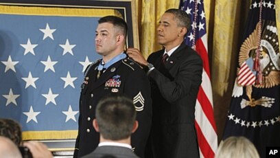 Sergeant First Class Leroy Arthur Petry, U.S. Army, waits to receive his  Medal of Honor from U.S. President Barack Obama for his heroic actions in  Afghanistan in May, 2008, during a ceremony