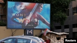 An advertisement of "Wonder Woman" movie is pictured near an army post in Beirut, Lebanon, May 31, 2017.