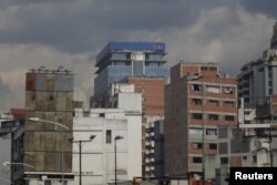 The logo of Citi is seen atop a building in Caracas, Venezuela, April 6, 2018.