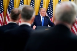 President Donald Trump speaks during an event to honor Bay of Pigs veterans, in the East Room of the White House, Sept. 23, 2020.