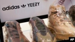 FILWE: Yeezy shoes made by Adidasin Paramus, N.J., Tuesday, Oct. 25, 2022. Adidas ended its partnership with West over his offensive and antisemitic remarks, a decision that the German sportswear company said would hit its bottom line. 