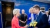 President of the European Commission, Ursula von der Leyen, left, is greeted as she arrives at the railway station in Kyiv, Ukraine, Sept. 20, 2024. 