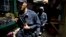 FILE - Honduras National Police officers patrol in El Mayoreo market in Tegucigalpa, Honduras, June 1, 2013. 