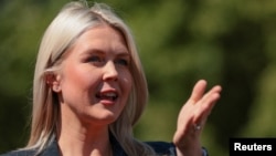 White House Press Secretary Karoline Leavitt speaks with media at the White House
