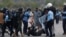 FILE PHOTO: Supporters of former Pakistani PM Imran Khan clash with police in Islamabad