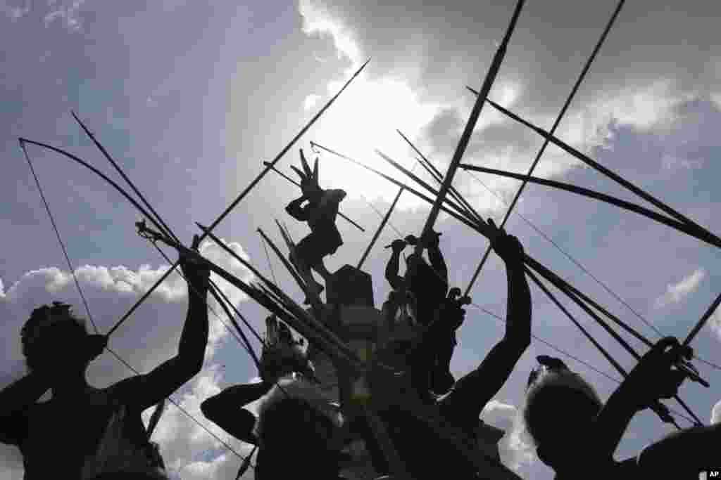 Indigenous people take part in Venezuelan "Indigenous Resistance Day" in Caracas, Venezuela, Oct. 12, 2024, marking 532 years since Cristobal Colon (Christopher Columbus) arrived in the Americas.