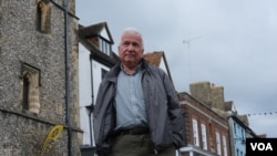 Veteran broadcaster Steve Vines is pictured in the British town of St. Albans after leaving Hong Kong over security concerns (Kris Cheng/VOA)