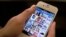 Instagram is demonstrated on an iPhone, in New York. (AP Photo/Karly Domb Sadof, File)