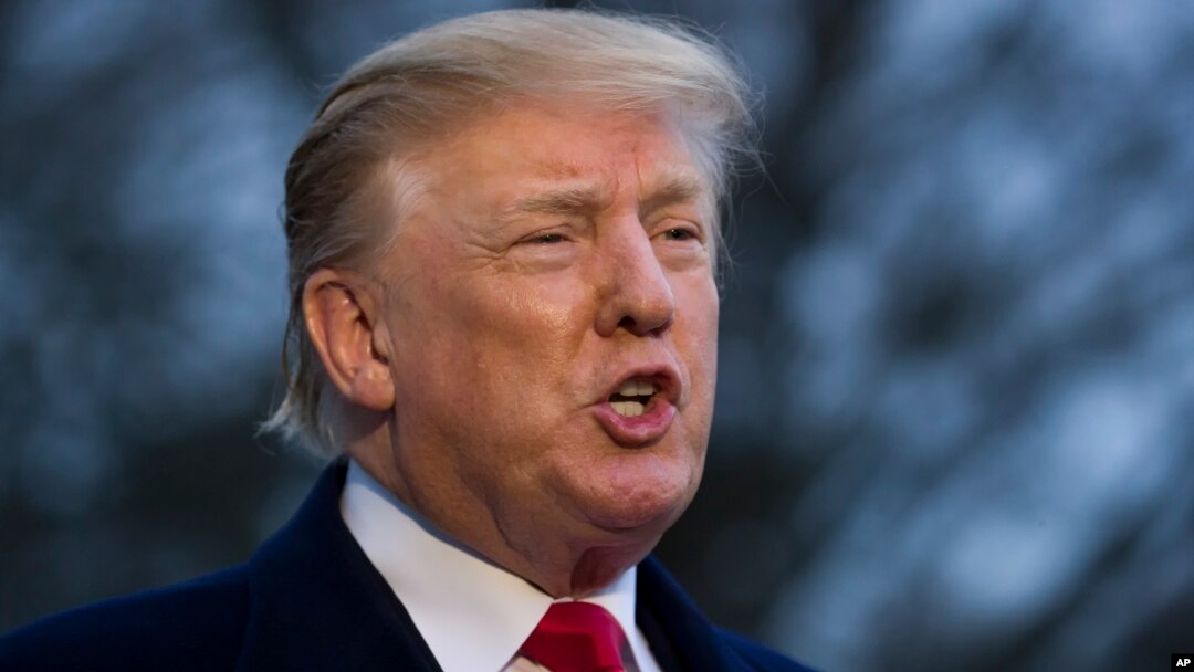 President Donald Trump speaks with the media after stepping off Marine One on the South Lawn of the White House, Sunday, March 24, 2019, in Washington. 