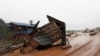 A military helicopter flies during the flood after the Xe Pian-Xe Namnoy hydropower dam collapsed in Attapeu province, Laos, July 26, 2018.