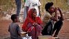 Ethiopian refugees who fled the fighting in Tigray Region at a border reception center in Gedaref State, eastern Sudan, Nov. 26, 2020. More than 40,000 refugees crossed from Ethiopia into Sudan since the conflict broke out on Nov. 4.