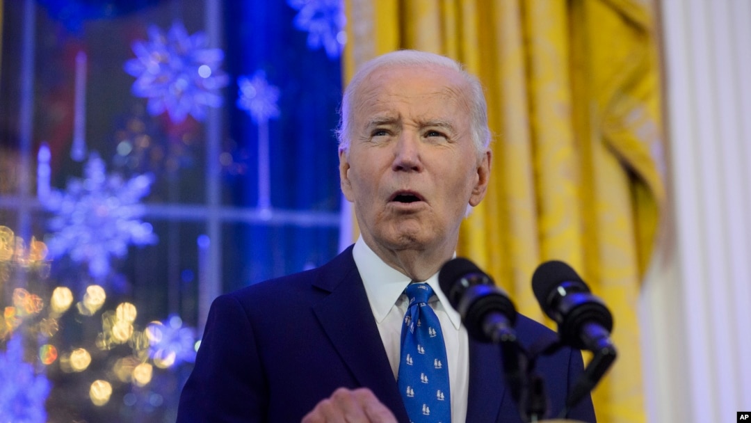 FILE - President Joe Biden speaks during a Hanukkah reception in the East Room of the White House in Washington, Dec. 16, 2024.
