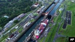 FILE — A cargo ship traverses the Agua Clara Locks of the Panama Canal in Colon, Panama, Sept. 2, 2024. 